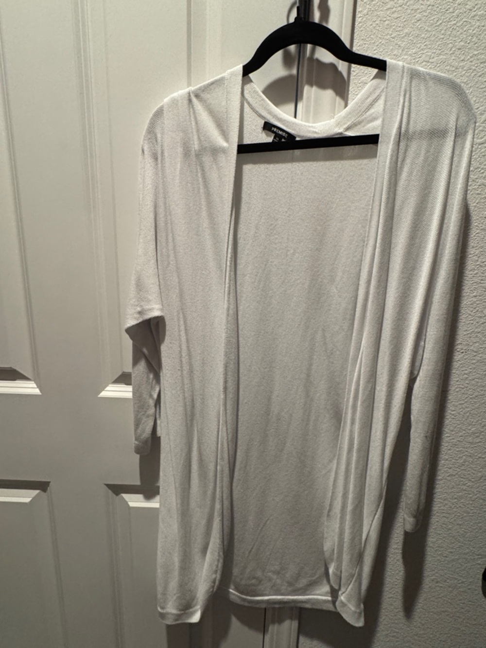 Premise White Knit Top with Black Tag Detail